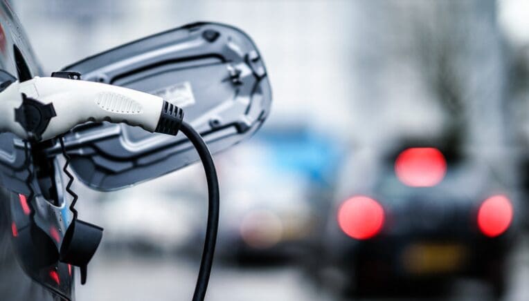 A close up of an electric car charging