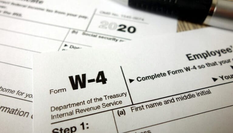 A close up of the irs form w-4